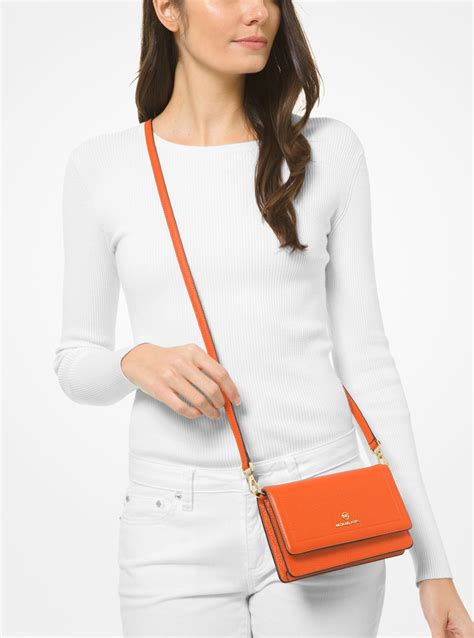 michael kors pebbled leather smartphone crossbody|michael kors mercer small.